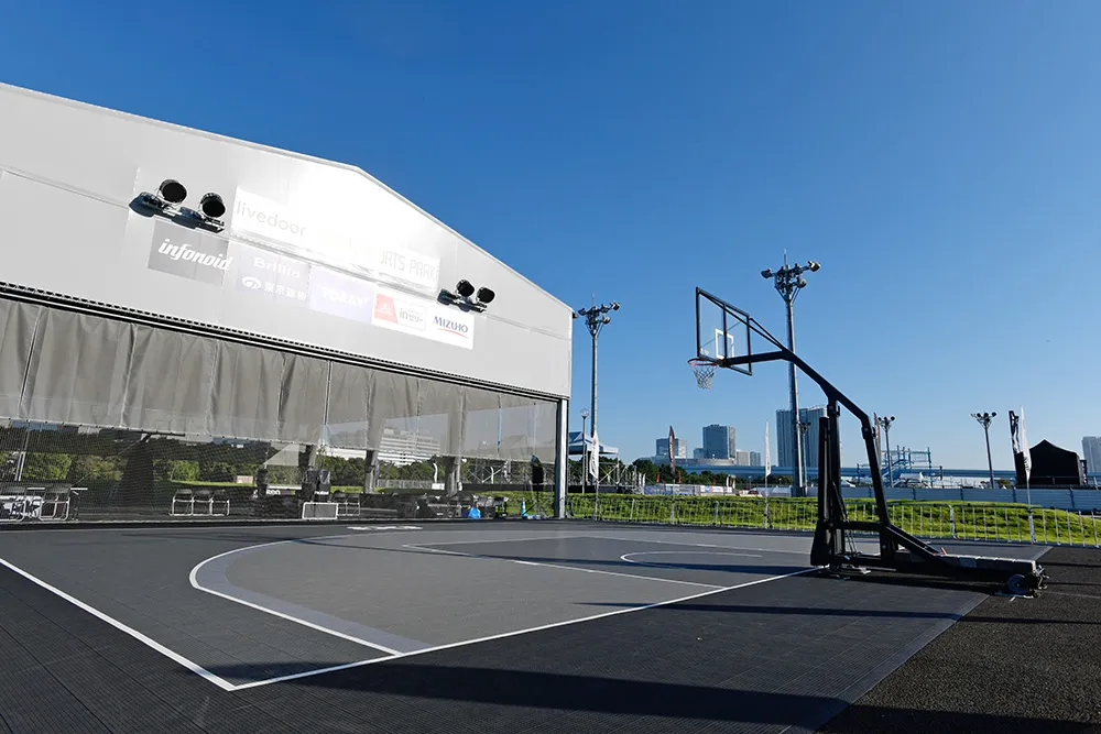 The 3x3 basketball court beside the park's hall